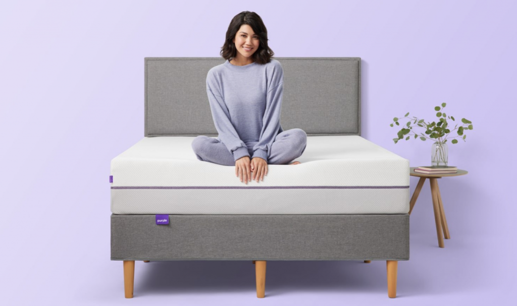 girl in purple mattress